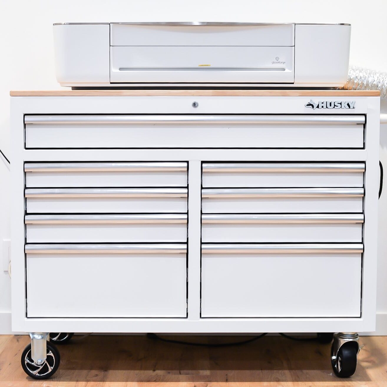 Husky Storage table for Glowforge - white with machine sitting on top